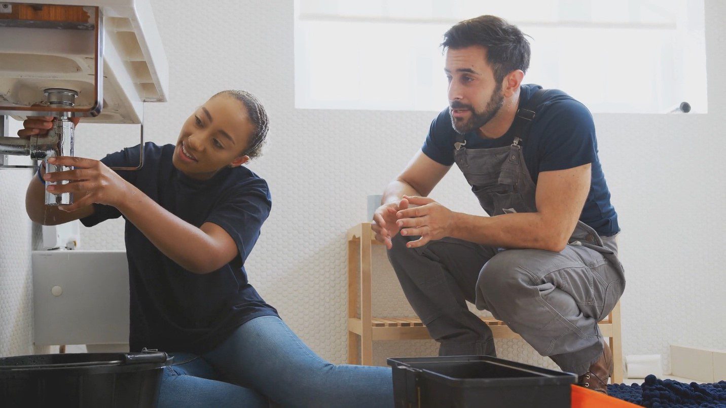 women doing plumber work.
